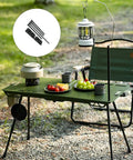 Quick-Release Aluminum Camp Table Legs With Telescoping Design and Stable Feet on an outdoor setup with cookware and fruit.