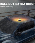 Magnetic Wireless Beacon Light With USB C Rechargeable LED Strobe For Trucks And Work Rigs Amber Emergency Flash Light on truck roof in rain.