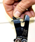 Hand using J Channel Notcher And Siding Cutter Combo Tool For Vinyl And Aluminum, Two Tools In One, built tough in the USA