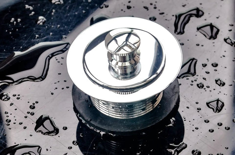 Heavy Duty Tub Drain Kit With Slick Push Pull Bathtub Strainer And Durable Zinc Alloy Body Plus Classic Chrome Finish shown on wet surface.