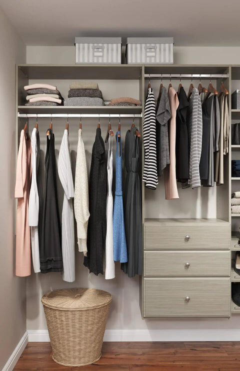 Rock Solid Dual Tower Closet Organizer Kit With Weathered Grey Finish and Slick Wall Mounted Steel Rail System Featuring Game Changing Drawers for Effortless Home Organization and No Fuss Assembly with clothes and baskets.
