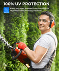 Man wearing Four Pack Clear Safety Glasses With UV400 And ANSI Z87.1 Standards Built For The Daily Grind, trimming hedge