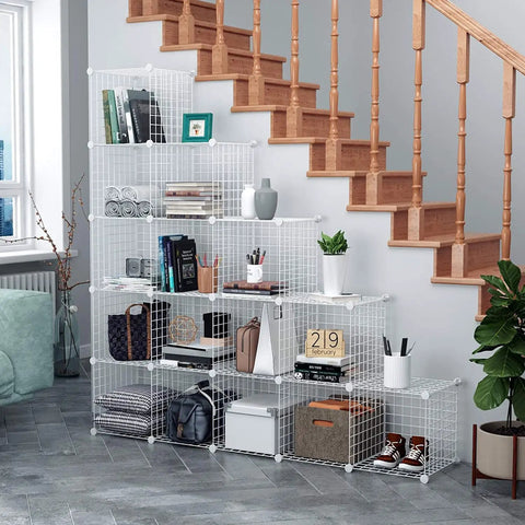 Wire Cube Storage Organizer Freely Configurable 20-Cube Grid Shelving System displaying books, decor, and plants in a living room.
