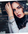 Close-up of a woman wearing a colorful Pentagram Glass Spacer Beads And Bracelet Making Kit With Earring Crafting Tools bracelet.