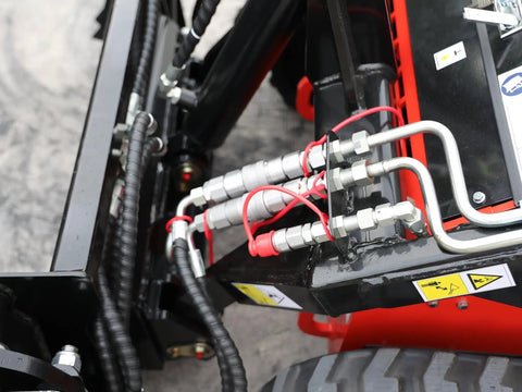 Hydraulic system of Mini Skid Steer Loader 1800 Lb Capacity With Four In One Bucket Attachment, detail view of pipes
