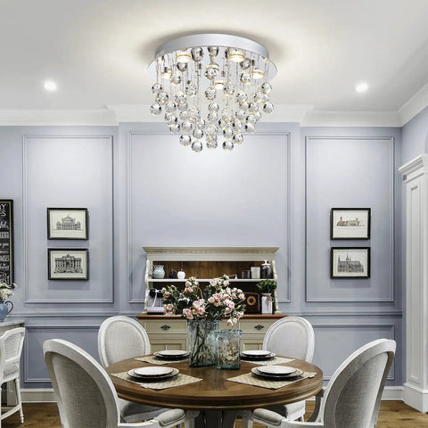 Dining room with Six-Light Modern Crystal Chandelier With K9 Crystals, Flush Mount Ceiling Fixture, Raindrop Style, LED compatible.