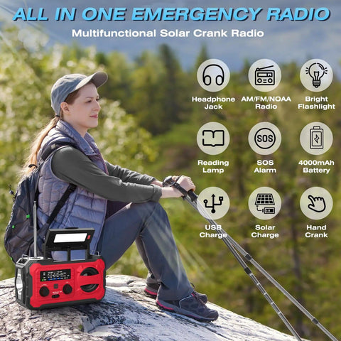 Person using Emergency Radio With NOAA Weather Radio And AM FM Bands 10000mAh Power Bank USB Solar And Hand Crank Charging outdoors