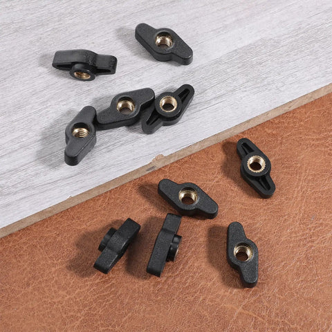 10 Piece Super Grippy Black Wing Knobs With 1/4-20 Threads for T-Track Jigs, displaying solid thumb screws on a wooden surface.