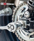 Heavy Hitter Adjustable Universal Socket Wrench clamps onto stripped rounded nuts, showing attachments near motorcycle engine.