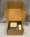 Rock Solid Brown Corrugated Shipping Boxes 6X5X3 Inches Bulk 28 Pack containing a speaker and microphone packaged securely.
