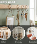 200 Piece 1 Inch Stainless Steel S Hooks For Curtain Hanging DIY Jewelry Pet Name Tags Key Rings Craft Assembly And Hella Versatile Mini Hardware Connector Clips displayed for kitchen and doorway use.