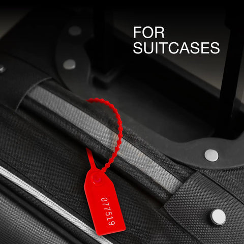 50 Numbered Fire Extinguisher Tamper Seals With Pull Tight Security Ties installed on suitcase