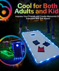 White LED Cornhole Lights For Hole And Board Complete 2 Board Kit with LED strands on lawn for game night