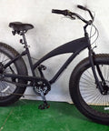 Beefy Fat Tire 26X4 Inch Threaded Steel Rigid Bike Fork for MTB and Road Cruisers attached to a black fat tire bicycle.