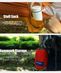 Close-up of Double Camping Hammock With Tree Hanging Kit And 12Kn Aluminum Wiregate Carabiner Parachute Nylon Lightweight Portable Gear showcasing storage pocket and sack.