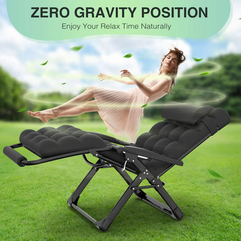 Woman relaxing in Oversized Zero Gravity Lounge Chair 29 Inch XL with cushion and headrest in a garden setting