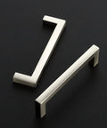 Two brushed nickel solid square bar cabinet handles, part of a 30 Pack Slim 3 3/4 Inch Center To Center set, shown on black background.