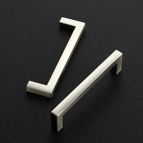 Two brushed nickel solid square bar cabinet handles, part of a 30 Pack Slim 3 3/4 Inch Center To Center set, shown on black background.