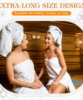 Two women sitting in a sauna wrapped in towels, highlighting the extra-long size design suitable for spa use.