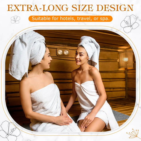 Two women sitting in a sauna wrapped in towels, highlighting the extra-long size design suitable for spa use.