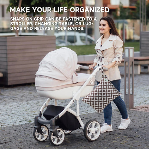 Leakproof Wet Dry Bag Set For Baby Gear 3 Pack Checkerboard Pattern attached to stroller handle in outdoor setting
