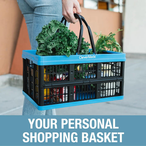 Person carrying Collapsible Plastic Grocery Baskets Pack Of 3 With Handles For Easy Haul in Car Trunk or SUV, Neptune Blue.