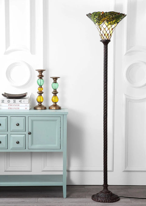 Bronze Botanical Tiffany-Style 71-Inch Torchiere Floor Lamp With Dope Handcrafted Stained Glass Bowl Shade in a living room setting