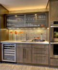 Modern kitchen with brown cabinets and stainless steel appliances, showcasing installed Antique Brass T Bar Cabinet Pulls Set Of 6 Knurled Zinc Alloy Handles With 12.6 Inch Center To Center Spacing, Durable Rust Resistant Hardware For Cabinets, Drawers And Wardrobes Premium Quality.