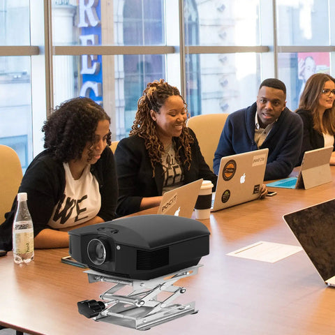4 Pack Stainless Steel Scissor Lift Table Jack For Laser Engraver Adjustable Height Stand under a projector in a meeting setting.