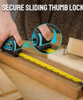 Using Magnetic Tape Measure 25 Ft With Fractions 1/8 Inch on wood with secure sliding thumb lock, dual-sided readings.