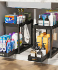 Heavy Duty Pull Out Under Sink Organizer Drawers Set Of Two Black Gliding Kitchen Cabinet Storage Carts holding cleaning products.