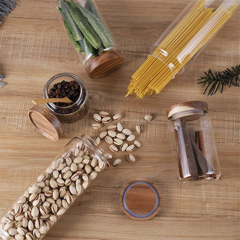 Straight Up Solid Airtight Coffee And Tea Storage Canister With Smooth Wood Lid storing coffee beans, pasta, and snacks on wood countertop.