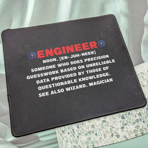 Engineer Definition Mouse Pad For Engineers And Engineering Students Nerd Gift Funny Mechanical Electrical Civil Engineer 9.5 Inch Desk Mat For Work Study And Gaming, showing humorous definition.