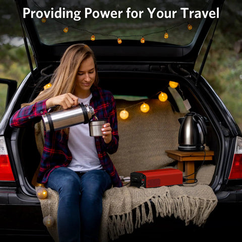 Badass 2000 Watt Pure Sine Wave Power Inverter Converts 12V DC To 110V AC For Rvs Trucks And Homes in use while traveler pours coffee.