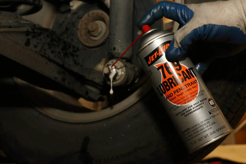 Multipurpose Penetrating Lubricant Aerosol That Digs In Non Flammable Military Grade Rust Inhibitor And Moisture Displacer Tough Corrosion Preventative No Fluorocarbons CO2 Propellant Pack Of 12 Units being used on vehicle suspension bolt