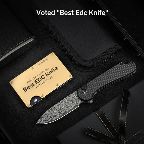 Elementum II Folding Pocket Knife With 2.96 Inch Damascus Blade And Carbon Fiber Handle, Slick Flipper Action With Ceramic Ball Bearing Pivot, Button Lock, Everyday Carry Ready For Daily Tasks. shown with open Damascus blade and carbon fiber handle