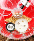 Close-up of Corn And Soybean Seeder Hand Push Roller Seeder with clear seed storage box showing seeds inside.