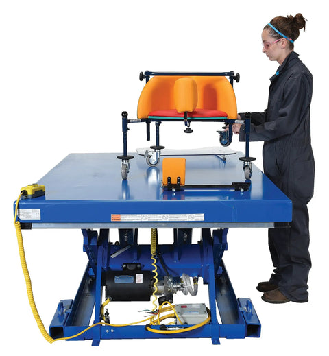 Heavy Duty Welded Steel Electric Hydraulic Lift Table With 48 By 72 Platform And 6000 Lbs Capacity Built Like A Brick House For Industrial Shops Osha Toe Guard Blue Finish in use.