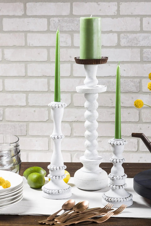 Milk Paint Finish Quart Classic White Pack Of 2 With Brushed Distressed Look, white candle holders on table with green candles.