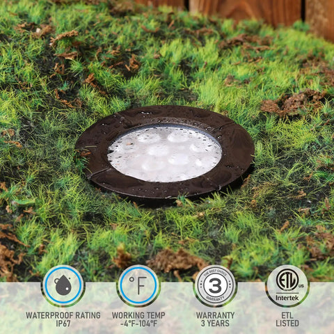 In Ground Well Lights Kit 4 Inch Flat Top, oil rubbed bronze aluminum, installed in grass with waterproof, temperature, warranty icons visible.
