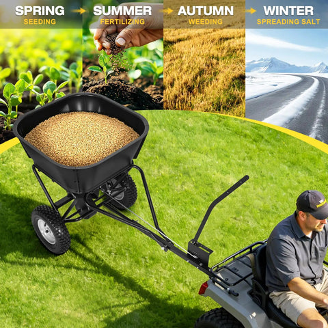 Heavy Duty Tow Behind Fertilizer And Seed Spreader With 130 Lb Hopper And Adjustable Flow Control For Even Coverage Up To 12 Ft Spread Width Perfect For Riding Mower Tractor Or ATV Use On Lawn And Garden attached to ATV on grass displaying year-round use.