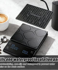 Rechargeable Coffee Scale with Timer for Pour Over and Espresso with black silicone cover on kitchen counter.