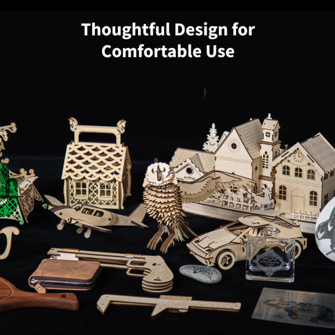 Various detailed wood and metal models engraved by a 10W Enclosed Laser Engraver And Cutter With Smart Camera Positioning
