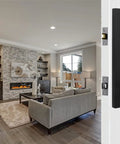 Addy Entry Handle With Philtower Lever For Reversible Left Or Right Hand Doors shown on a white door opening to a living room