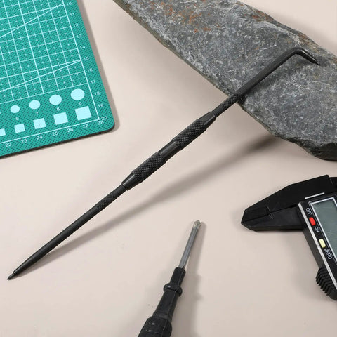 Double Pointed Carbide Scribe Tool Heavy Duty Metal Marking Pen For Welding Glass Ceramics Sheet Metal with smooth grip on a workbench