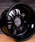 High Gloss Black Powder Coating For Automotive Wheels And Parts 1 Lb USA Made on a black car wheel with deep gloss finish