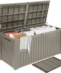 Beefy 220 Gallon Outdoor Deck Storage Box With Removable Divider, Waterproof Resin Chest open showing stored cushions, light brown