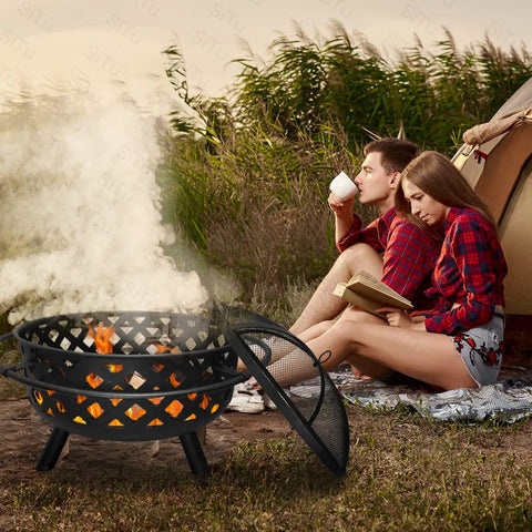 24 Inch Fire Pit With 2 Poker Tools And Cover, Outdoor Wood Burning Firepit with couple camping by tent and fire.