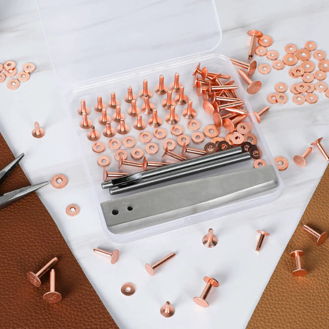 Copper Leather Rivets Kit With Burrs, Setter Tool And Punches, 50 Sets Of Pro Grade Leather Fasteners in storage box on table