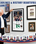 Man pointing to Newspaper Display Frame with premium wood and acrylic panel showcasing a Boston Globe front page, ideal home office decor.